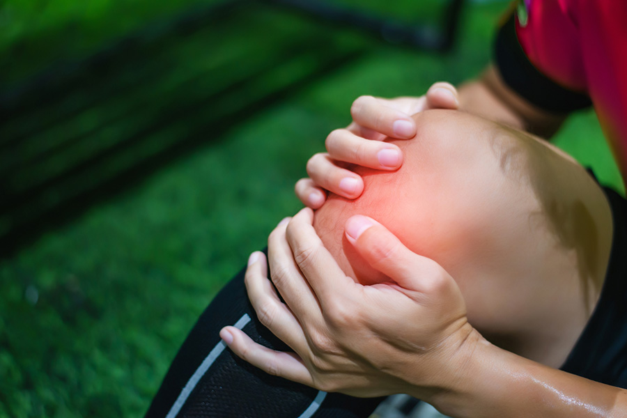 Soccer player closeup of knee injury