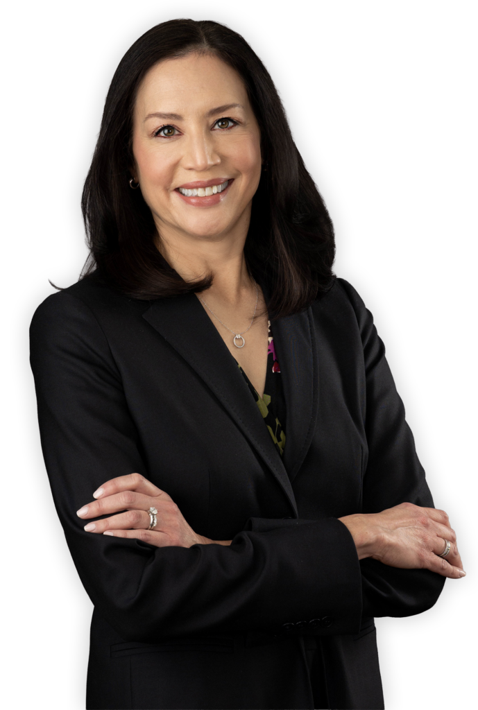 Laura Hegwer standing and smiling with arms crossed.